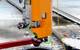 The Nortek DVL1000 leads the way as the inspection vehicle enters a tank. The DVL operates to a high degree of accuracy in the harsh environment inside. Image courtesy Nortek/Square Robot