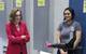 An Oregon State student shows Gov. Brown a robotic arm. (photo: Theresa Hogue)