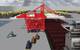 Portunus showing interface of triple-pick cranes and automated guided vehicles and automated stacks in the background.  (LLNL photo; Inset photo courtesy ZPMC)