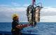 Pump Profiling System (PPS) during deployment
Osvaldo Ulloa (Principal Investigator, Universidad de Concepción) steadies the Pump Profiling System (PPS) during deployment. The PPS is slowly deployed to a depth of approximately 400 meters. It can collect real-time, high-resolution vertical profile data of conductivity (salinity), temperature, dissolved oxygen, fluorescence (an index of phytoplankton biomass), beam attenuation (an index of particle concentration), and light intensity. As it descen