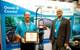 Two representatives displaying their IEEE OES Institute Award given to Aanderaa (Photo: Stan Chamberlain)