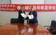 Yuan Shao Hong (right), Director of Engineering and Secretary of the Polar Research Institute of China's party committee and Francis Wong from MacGregor at the contract signing (Photo: MacGregor)