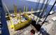Siemens is currently working on four HVDC platforms, with HelWin1 being the smallest of the four. The individual platform weighs more than 20 fully loaded and fueled Airbus A380 super airliners and is 75 meters long and 50 meters wide, with a surface area of 3,750 square meters. This is more than half the size of a standard soccer field (7,140 square meters). Seven decks are distributed over its total height of 27 meters.