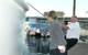 R/V Spirit of the Sound christened by her godmother Astrid Heidenreich on Friday, September 26, 2014. She is assisted by boat build project manager Robert Kunkel, Amtech. (Photo courtesy of the Maritime Aquarium at Norwalk)