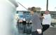 R/V Spirit of the Sound christened by her godmother Astrid Heidenreich on Friday, September 26, 2014. She is assisted by boat build project manager Robert Kunkel, Amtech. 