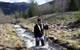What:	Hydrologist Measuring Streamflow When:	4/11/2014 Where: 	Smelterville, ID, USA  Details:	USGS hydrologist Greg Clark measures streamflow on Government Gulch Creek, a tributarty to the Coeur d’Alene River in northern Idaho. Streamflow data collected are included in the Coeur d’Alene Basin Environmental Monitoring Program the USGS conducts in cooperation with the Environmental Protection Agency.  Credit: U.S. Geological Survey  Department of the Interior/USGS U.S. Geological Survey/photo: De
